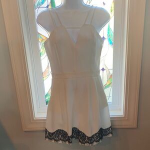 Jealous Tomato White spaghetti strap romper with Black Lace Accents